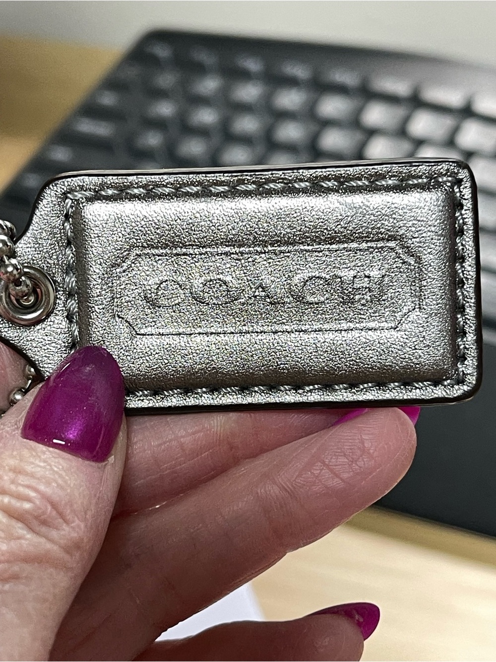 Coach Metallic Silver Leather Hang Tag
